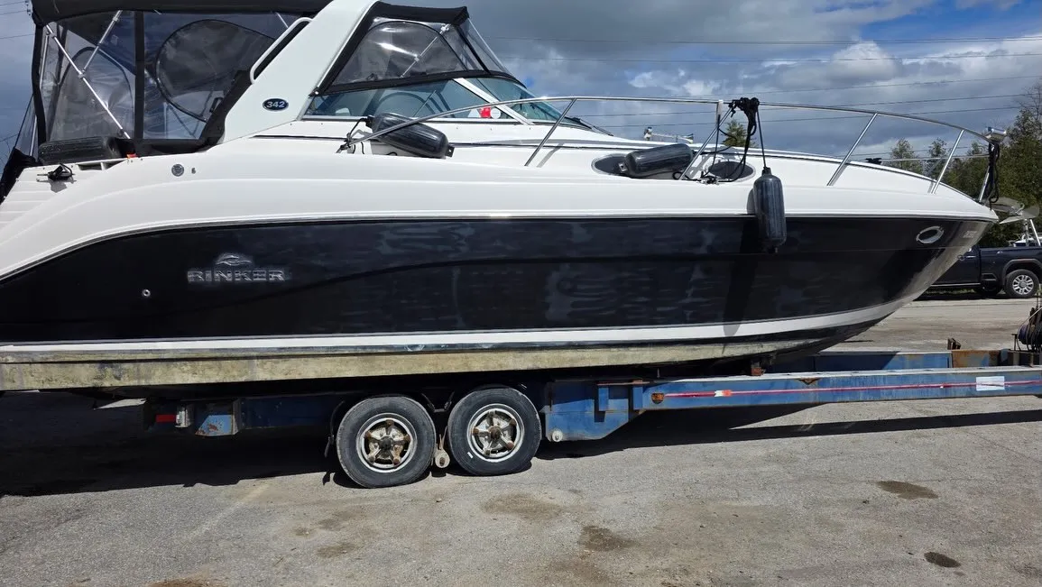 Cabin cruiser on its trailer, freshly detailed