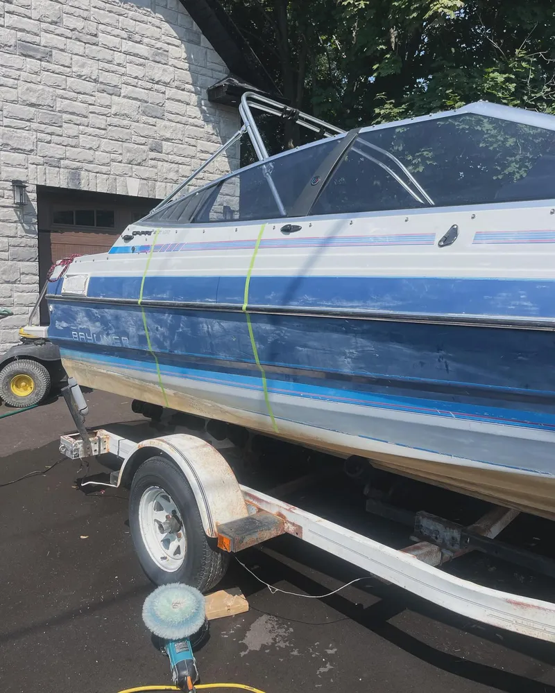 Bowrider on its trailer mid-detail